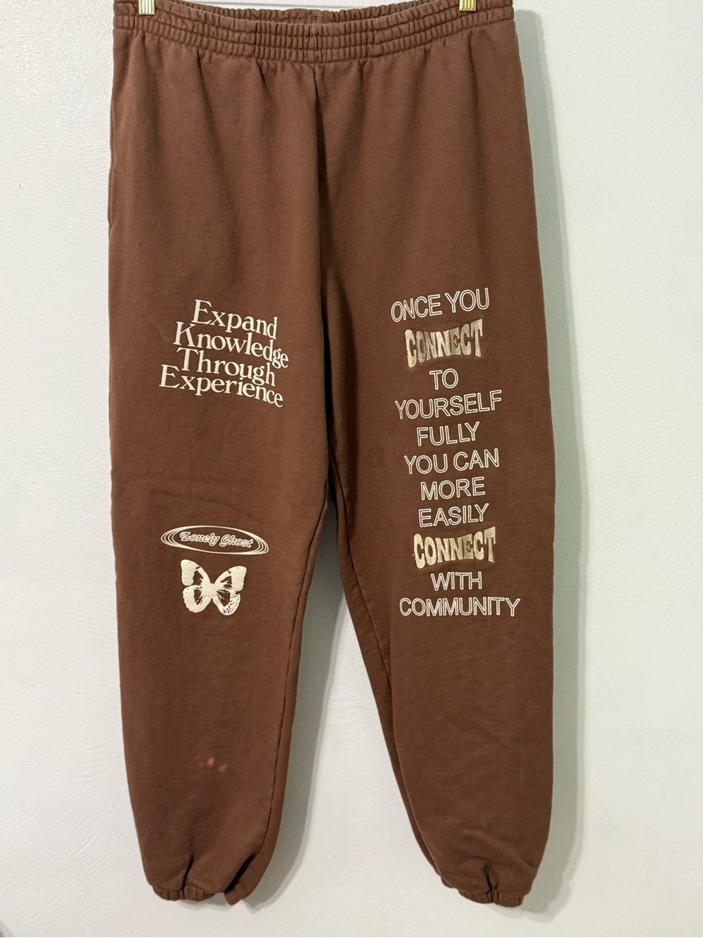 LONELY GHOST Brown Sweatpants with Cream Graphic Text *desc*